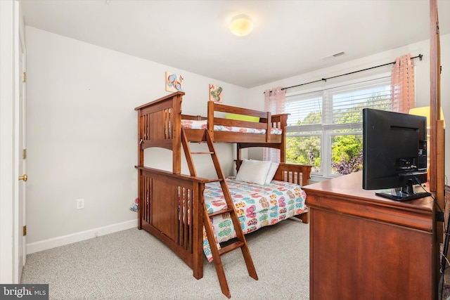 9729 Village Ln Unit 9715C, Ocean City, MD 21842 - bedroom with baseboards and light carpet