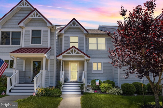 9729 Village Ln Unit 9715C, Ocean City, MD 21842 - townhome / multi-family property featuring a standing seam roof and metal roof