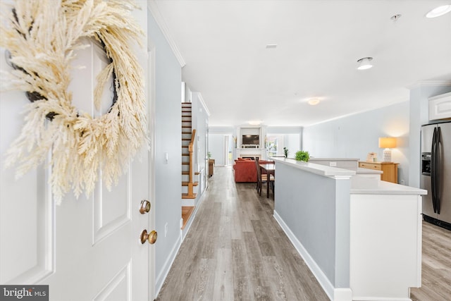 9729 Village Ln Unit 9715C, Ocean City, MD 21842 - hall with crown molding, light wood-type flooring, and baseboards