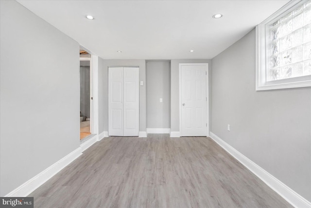 3910 The Alameda, Baltimore, MD 21218 - unfurnished bedroom featuring wood finished floors, baseboards, recessed lighting, and a closet