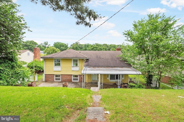 3910 The Alameda, Baltimore, MD 21218 - back of house with a patio area and a chimney