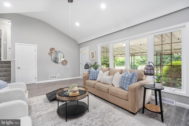 3910 The Alameda, Baltimore, MD 21218 - living room featuring lofted ceiling, wood finished floors, baseboards, stairway, and recessed lighting