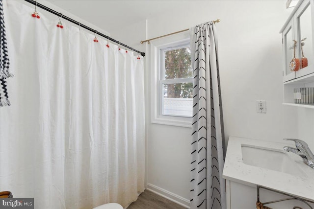 6156 Drum Point Rd, Deale, MD 20751 - bathroom featuring vanity, wood finished floors, and a shower with curtain