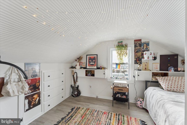 6156 Drum Point Rd, Deale, MD 20751 - bedroom with vaulted ceiling, wood finished floors, and baseboards