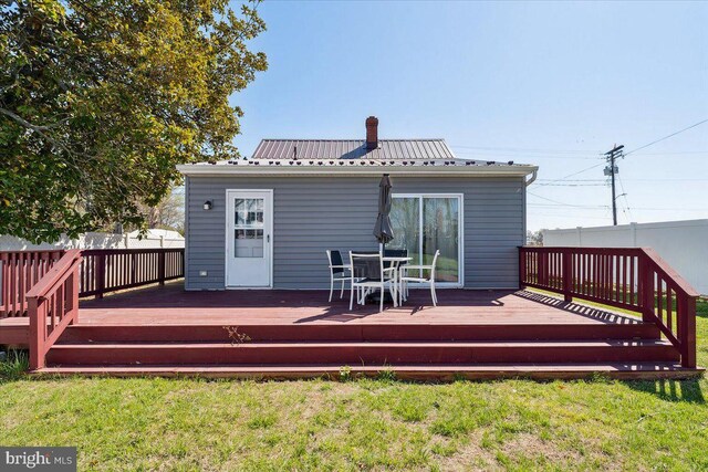 6156 Drum Point Rd, Deale, MD 20751 - back of house with a yard, a wooden deck, and metal roof