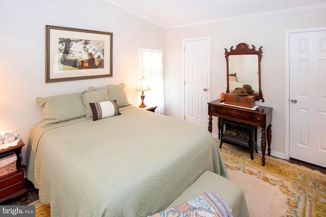 312 Farm Ln, North Wales, PA 19454 - bedroom with crown molding, light wood-style flooring, vaulted ceiling, and baseboards