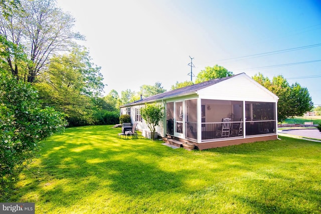 312 Farm Ln, North Wales, PA 19454 - view of grassy yard with a sunroom