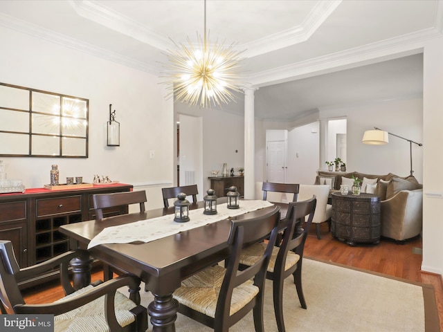 3903 Beeker Mill Pl, Chantilly, VA 20151 - dining space with wood finished floors, crown molding, a tray ceiling, and a chandelier