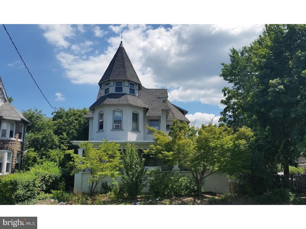 503 Walnut St, Lansdale, PA 19446 - view of front of home with stucco siding and a shingled roof