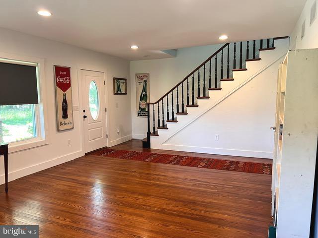 7299 Marshall St, Lincoln, DE 19960 - foyer entrance featuring stairway, baseboards, wood finished floors, and recessed lighting