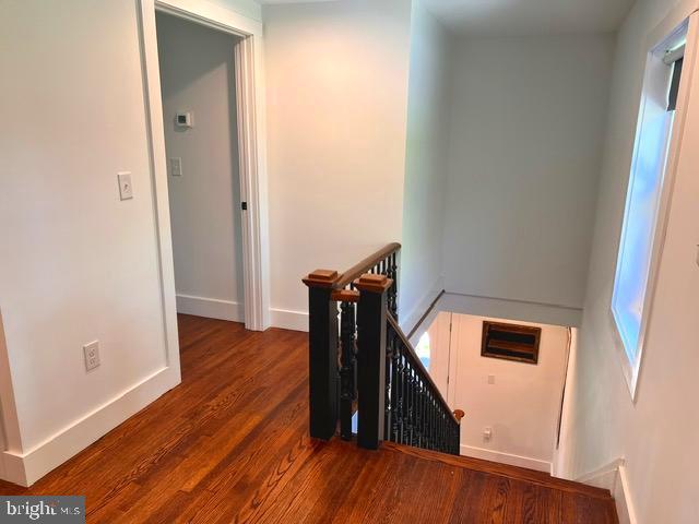 7299 Marshall St, Lincoln, DE 19960 - stairway with wood finished floors and baseboards