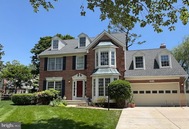 7472 Rosewood Manor Ln, Gaithersburg, MD 20882 - view of front of house featuring a shingled roof, a front yard, and concrete driveway