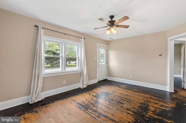 934 Fieldsboro Rd, Townsend, DE 19734 - spare room with a ceiling fan, wood-type flooring, and baseboards
