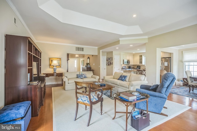 1 Hedge Row Rd, Princeton, NJ 08540 - living room with wood finished floors, ornamental molding, a raised ceiling, and recessed lighting