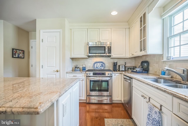 1 Hedge Row Rd, Princeton, NJ 08540 - kitchen with stainless steel appliances, dark wood-style flooring, white cabinets, glass insert cabinets, and recessed lighting