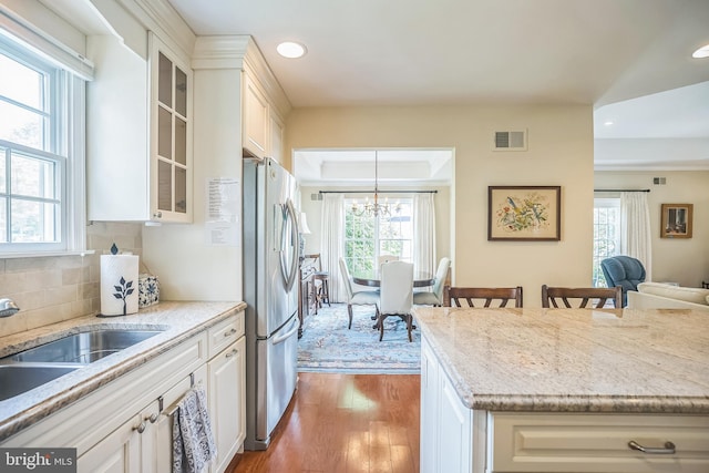 1 Hedge Row Rd, Princeton, NJ 08540 - kitchen featuring freestanding refrigerator, dark wood-style floors, a chandelier, recessed lighting, and glass insert cabinets