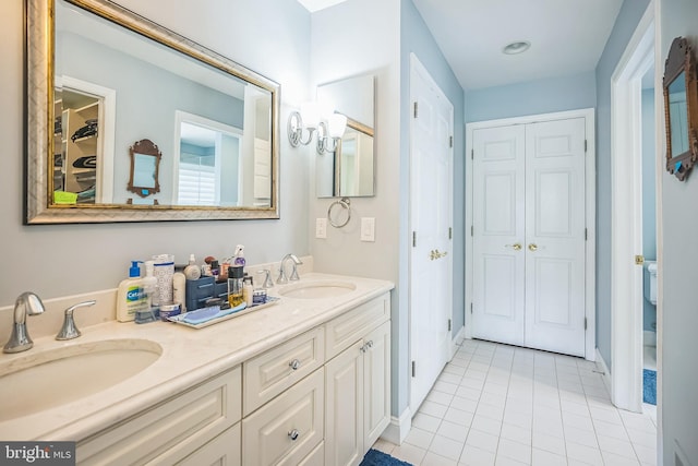 1 Hedge Row Rd, Princeton, NJ 08540 - bathroom featuring a closet, double vanity, and tile patterned flooring