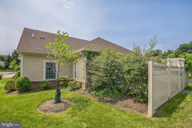 1 Hedge Row Rd, Princeton, NJ 08540 - view of side of property featuring a lawn, a shingled roof, and brick siding