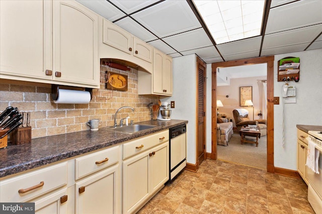 14 Providence Ave, Doylestown, PA 18901 - kitchen featuring white appliances, a sink, baseboards, cream cabinets, and dark countertops