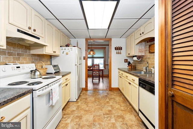 14 Providence Ave, Doylestown, PA 18901 - kitchen with white appliances, under cabinet range hood, dark countertops, and a sink