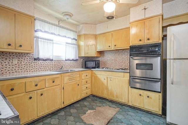 1103 Laurel Rd, Edgewater Park, NJ 08010 - kitchen featuring stainless steel appliances, a warming drawer, a sink, dark floors, and light countertops