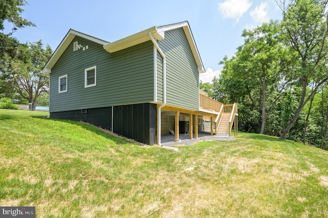 2968 Sulphur Springs Rd, Inwood, WV 25428 - view of property exterior featuring stairway, a deck, and a lawn