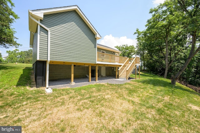2968 Sulphur Springs Rd, Inwood, WV 25428 - back of house with stairs, a wooden deck, and a yard