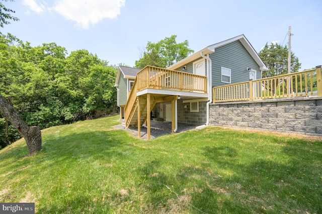 2968 Sulphur Springs Rd, Inwood, WV 25428 - rear view of property featuring stairway, a deck, and a lawn