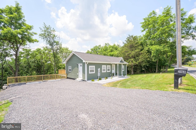 2968 Sulphur Springs Rd, Inwood, WV 25428 - view of front of home with a front lawn, driveway, and view of wooded area