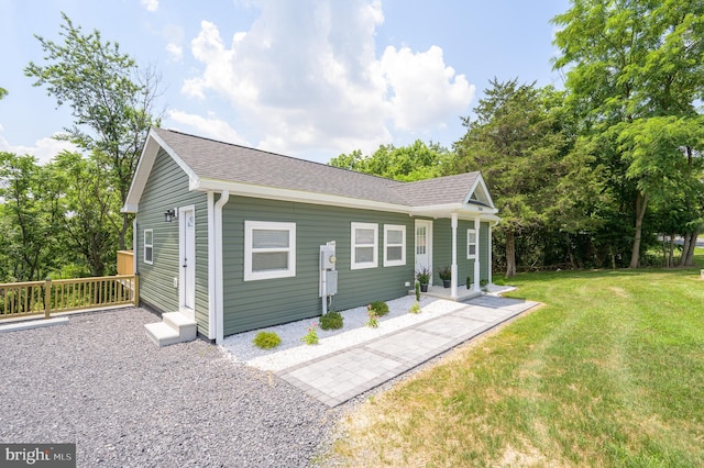 2968 Sulphur Springs Rd, Inwood, WV 25428 - view of property exterior featuring a lawn and a shingled roof