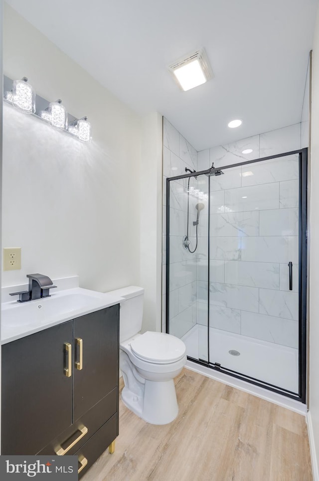 2968 Sulphur Springs Rd, Inwood, WV 25428 - full bathroom with wood finished floors, a shower stall, and vanity