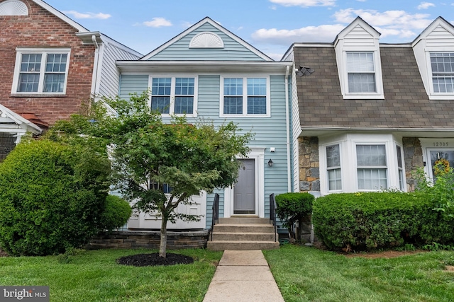 12307 Sandy Point Ct, Silver Spring, MD 20904 - view of front of home with a front lawn, stone siding, and a shingled roof
