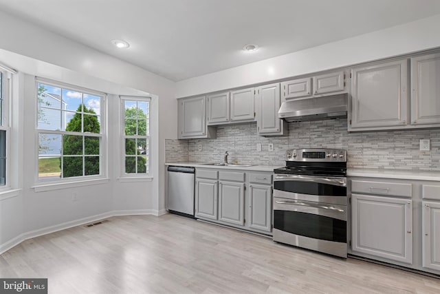 12307 Sandy Point Ct, Silver Spring, MD 20904 - kitchen with appliances with stainless steel finishes, gray cabinets, under cabinet range hood, light countertops, and recessed lighting