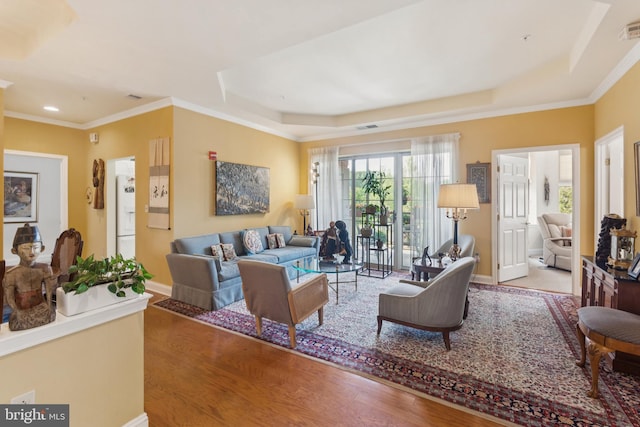 2118 Windrow Dr, Princeton, NJ 08540 - living room featuring a raised ceiling, wood finished floors, baseboards, ornamental molding, and recessed lighting