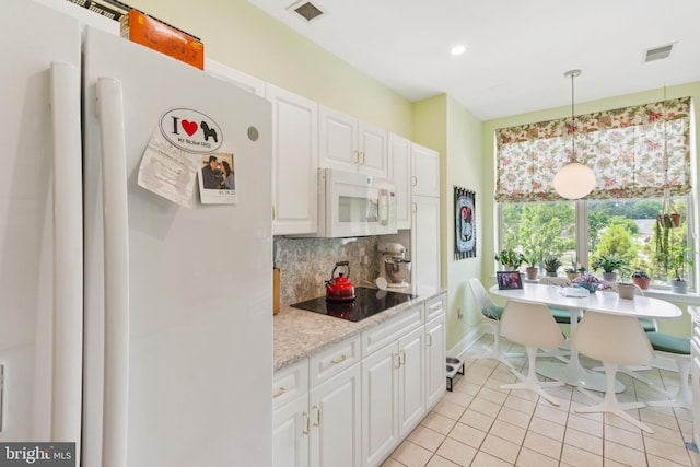 2118 Windrow Dr, Princeton, NJ 08540 - kitchen featuring white appliances, tasteful backsplash, white cabinets, light tile patterned floors, and pendant lighting