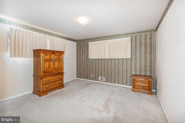 1513 Chapel Hill Dr, Baltimore, MD 21237 - unfurnished bedroom with carpet flooring, wallpapered walls, and baseboards