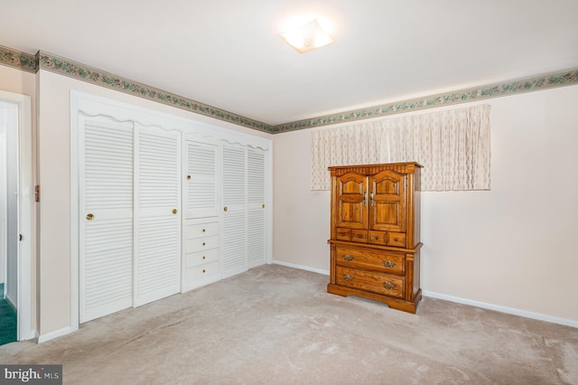 1513 Chapel Hill Dr, Baltimore, MD 21237 - carpeted bedroom featuring a closet and baseboards