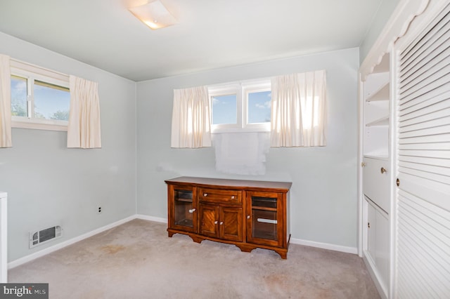 1513 Chapel Hill Dr, Baltimore, MD 21237 - interior space with carpet flooring, plenty of natural light, and baseboards