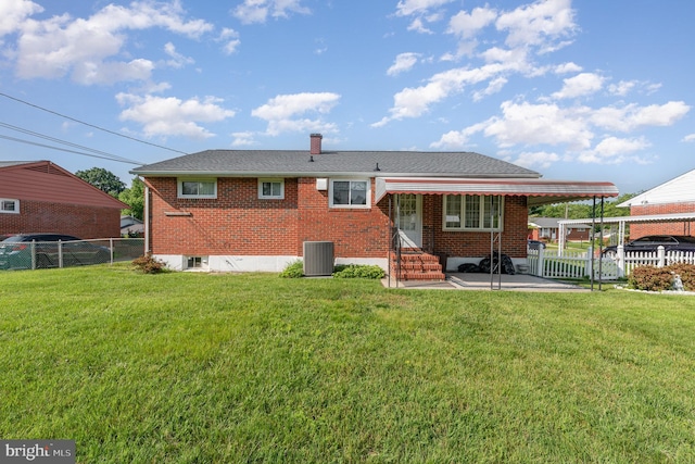1513 Chapel Hill Dr, Baltimore, MD 21237 - back of house with brick siding, entry steps, central AC, and a chimney