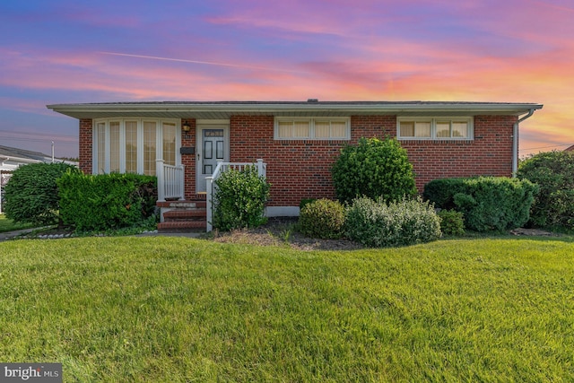 1513 Chapel Hill Dr, Baltimore, MD 21237 - single story home with a front lawn and brick siding