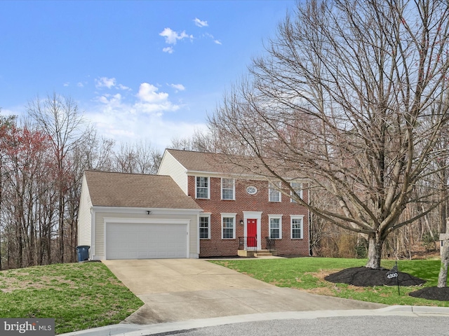 4300 Cullowhee Ct, Clinton, MD 20735 - colonial inspired home with a garage, concrete driveway, a front lawn, and brick siding