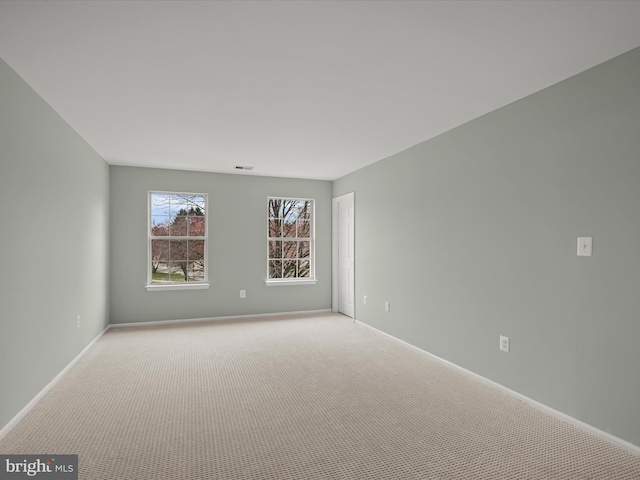 4300 Cullowhee Ct, Clinton, MD 20735 - empty room featuring light carpet and baseboards