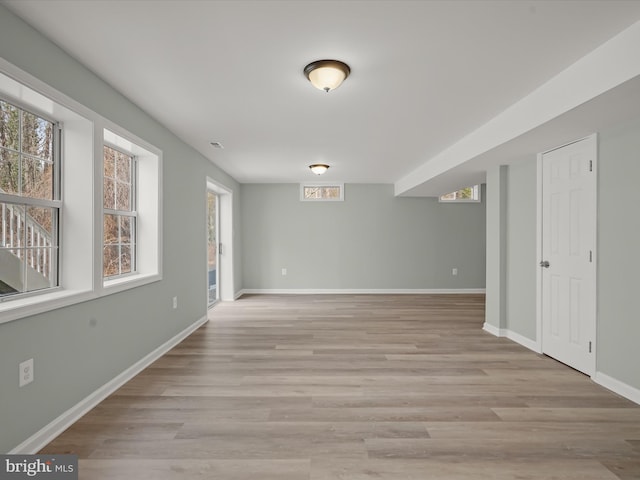 4300 Cullowhee Ct, Clinton, MD 20735 - empty room featuring plenty of natural light, baseboards, and light wood finished floors
