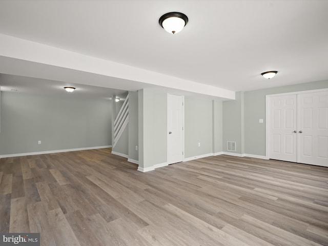 4300 Cullowhee Ct, Clinton, MD 20735 - finished below grade area with wood finished floors, baseboards, and stairs