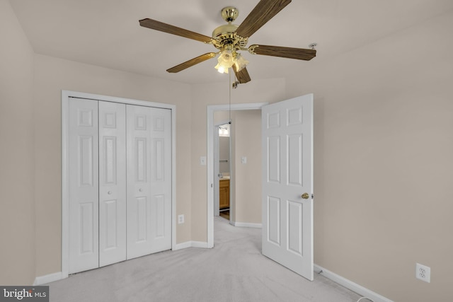 11476 Leland Pl, Waldorf, MD 20601 - unfurnished bedroom with baseboards, light colored carpet, a closet, and ceiling fan