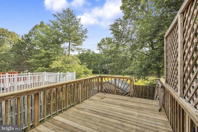 11476 Leland Pl, Waldorf, MD 20601 - wooden terrace with view of wooded area