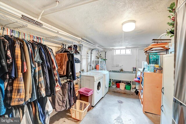 29 S Rockburn St, York, PA 17402 - basement with washer and clothes dryer and a textured ceiling