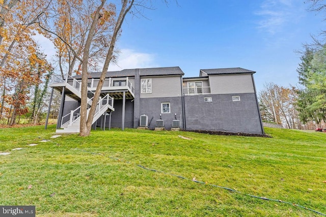 417 Overlook Dr, Front Royal, VA 22630 - back of property with stairs, a yard, a wooden deck, and central AC unit