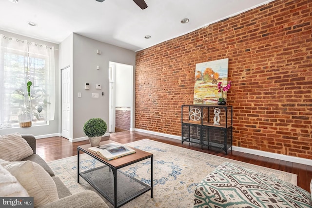 424 N Luzerne Ave N, Baltimore, MD 21224 - living area featuring baseboards, brick wall, hardwood / wood-style floors, a ceiling fan, and recessed lighting
