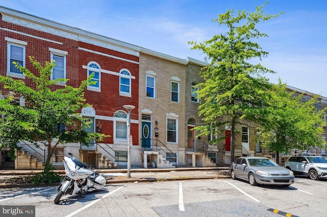 424 N Luzerne Ave N, Baltimore, MD 21224 - multi unit property with uncovered parking and brick siding